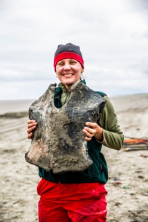 Lesley holding a whale sternum