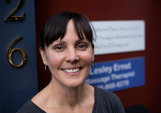 Lesley standing at her office door